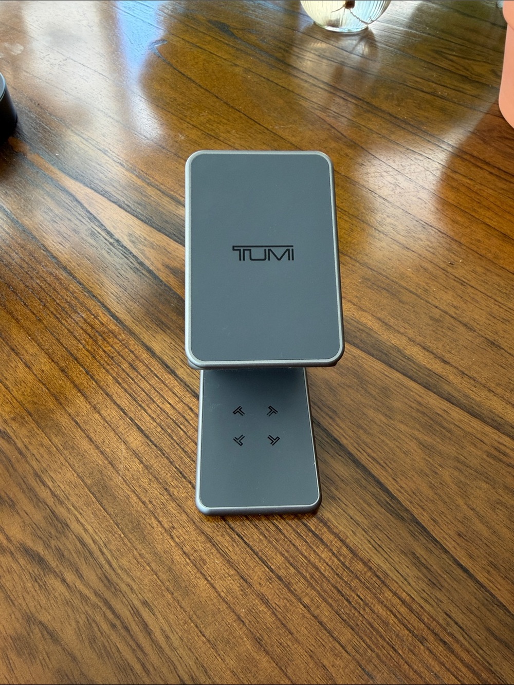Tumi Foldable Phone Stand and 3-way charger in Gray and Silver